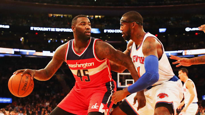 Oct 22, 2014; New York, NY, USA;  New York Knicks forward Amar'e Stoudemire (1) defends Washington Wizards center DeJuan Blair (45) during the second quarter at Madison Square Garden. Mandatory Credit: Anthony Gruppuso-USA TODAY Sports