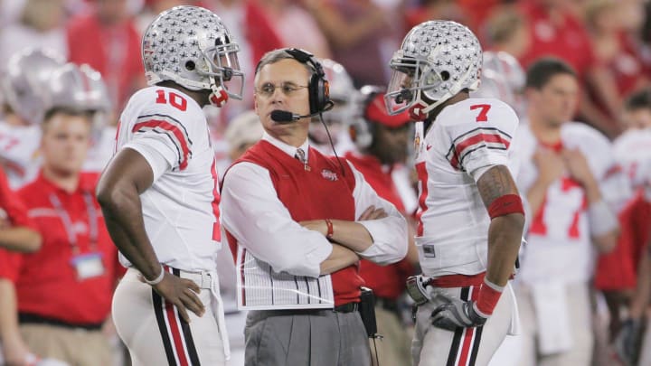 Ohio State hoped that Heisman Trophy winner Troy Smith, left, and speedy Ted Ginn Jr., right, could beat Florida for another national championship on Jan. 8, 2007. But Tressel saw his team fall behind and never recover in a 41-14 loss at University of Phoenix Stadium in Glendale, Arizona.
Ncl Bcsosu Ohio State hoped that Heisman Trophy winner Troy Smith, left, and speedy Ted Ginn Jr., right, could beat Florida for another national championship on Jan. 8, 2007. But Tressel saw his team fall behind and never recover in a 41-14 loss at University of Phoenix Stadium in Glendale, Arizona.
Ncl Bcsosu