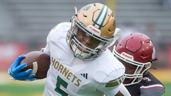 Poplarville's Tylan "Ty" Keys (5) rushed for 506 yards and tied a Mississippi state record with eight rushing touchdowns in a 60-54 win over Hancock on Friday night.