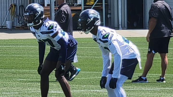 Devon Witherspoon and Riq Woolen prepare for the snap during a positional drill at Seahawks minicamp. Devon Witherspoon and Riq Woolen prepare for the snap during a positional drill at Seahawks minicamp.
