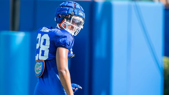 Florida defensive back Devin Moore (28) runs a drill during Florida spring football practice at