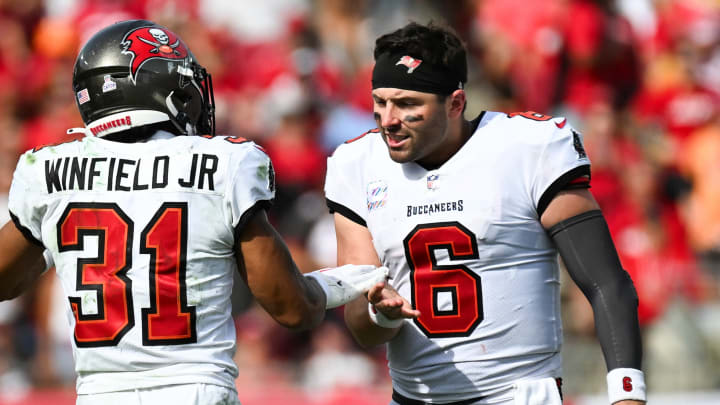 Tampa Bay Buccaneers defensive back Antoine Winfield Jr. (31) celebrates with quarterback Baker Mayfield (6) after causing a turnover in the second half against the Atlanta Falcons at Raymond James Stadium in Tampa, Fla., on Oct. 22, 2023.
