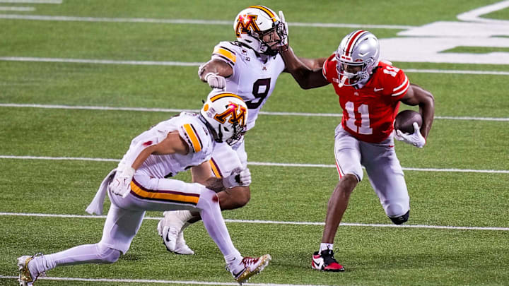 Ohio State Buckeyes wide receiver Quincy Porter (11) runs the ball against the Minnesota Golden Gophers in the second half of the NCAA football game at Ohio Stadium on Saturday, Oct. 4, 2025 in Columbus, Ohio.