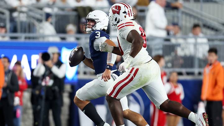 Penn State Nittany Lions quarterback Rocco Becht (3) runs with the ball against the Wisconsin Badgers at Beaver Stadium. Penn State Nittany Lions quarterback Rocco Becht (3) runs with the ball against the Wisconsin Badgers at Beaver Stadium.