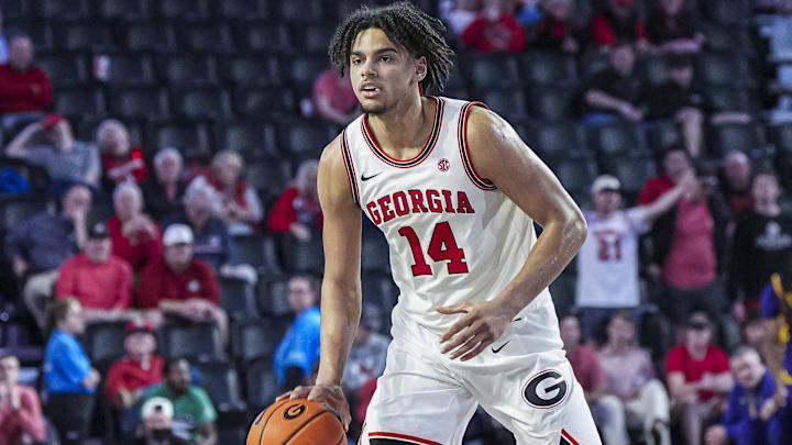 Feb 5, 2025; Athens, Georgia, USA; Georgia Bulldogs forward Asa Newell (14) controls the ball against the LSU Tigers during the second half at Stegeman Coliseum. Mandatory Credit: Dale Zanine-Imagn Images
