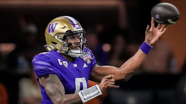 Washington Huskies quarterback Michael Penix Jr. (9) pass the ball during the Sugar Bowl College