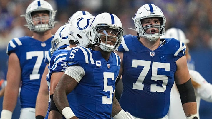 Indianapolis Colts quarterback Anthony Richardson (5) and fellow members of the Colts offensive line look to the score board after a play ended in the Los Angeles Rams' favor during the first half of the game Sunday, Oct. 1, 2023, at Lucas Oil Stadium in Indianapolis.