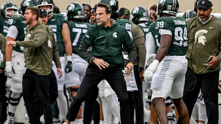 Michigan State's defensive coordinator Joe Rossi celebrates after a Spartans sack against Penn State during the first quarter on Saturday, Nov. 15, 2025, at Spartan Stadium in East Lansing.