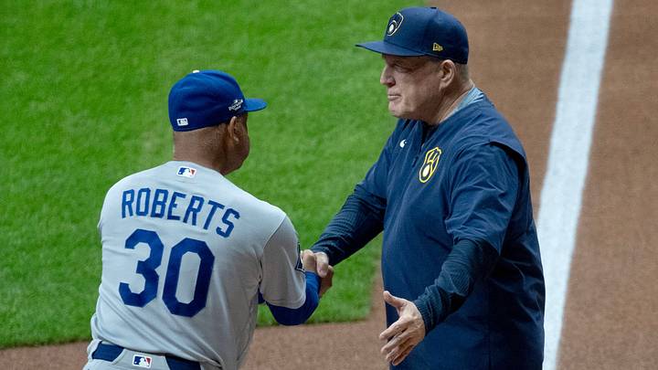 Los Angeles Dodgers manager Dave Roberts and Milwaukee Brewers manager Pat Murphy greet one another before their National League Championship Series game at American Family Field on Oct 11, 2026. Los Angeles Dodgers manager Dave Roberts and Milwaukee Brewers manager Pat Murphy greet one another before their National League Championship Series game at American Family Field on Oct 11, 2026.