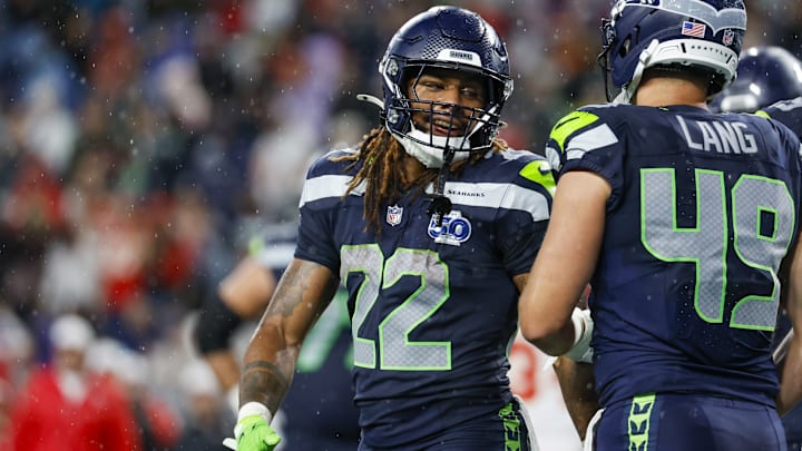 Aug 15, 2025; Seattle, Washington, USA; Seattle Seahawks running back Damien Martinez (22) celebrates with teammates after rushing for a touchdown against the Kansas City Chiefs during the third quarter at Lumen Field. 