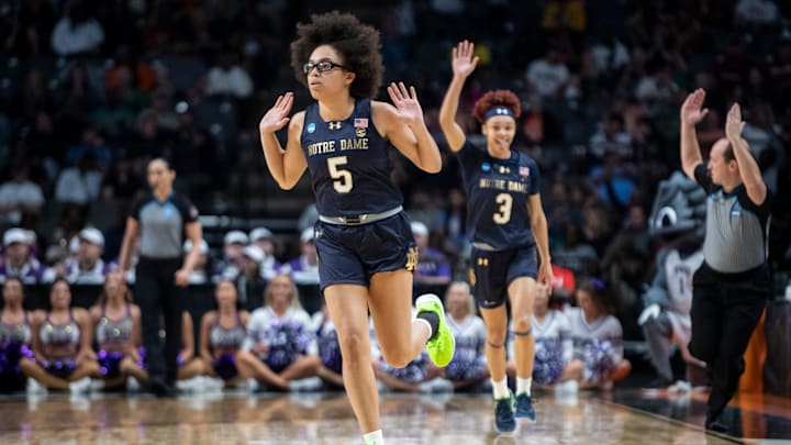 Notre Dame Fighting Irish guard Olivia Miles (5) celebrates a three-pointer as TCU Horned Frogs face off with Notre Dame Fighting Irish during the Sweet 16 at Legacy Arena in Birmingham, Ala., on Saturday, March 29, 2025.