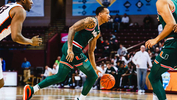 Miami's Matthew Cleveland (0) looking to score against Oklahoma State in the 2024 Charleston Classic.