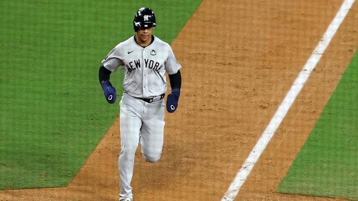 Oct 26, 2024; Los Angeles, California, USA; New York Yankees outfielder Juan Soto (22) scores a run against the Los Angeles Dodgers in the ninth inning for game two of the 2024 MLB World Series at Dodger Stadium. Mandatory Credit: Kiyoshi Mio-Imagn Images Oct 26, 2024; Los Angeles, California, USA; New York Yankees outfielder Juan Soto (22) scores a run against the Los Angeles Dodgers in the ninth inning for game two of the 2024 MLB World Series at Dodger Stadium. Mandatory Credit: Kiyoshi Mio-Imagn Images