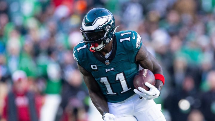 Dec 31, 2023; Philadelphia, Pennsylvania, USA; Philadelphia Eagles wide receiver A.J. Brown (11) runs with the ball during the fourth quarter against the Arizona Cardinals at Lincoln Financial Field.  
