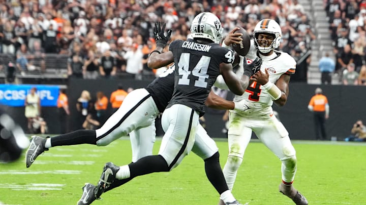 Sep 29, 2024; Paradise, Nevada, USA; Las Vegas Raiders defensive end Charles Snowden (49) and defensive end K'Lavon Chaisson (44) stop Cleveland Browns quarterback Deshaun Watson (4) in the fourth quarter at Allegiant Stadium. Mandatory Credit: Stephen R. Sylvanie-Imagn Images Sep 29, 2024; Paradise, Nevada, USA; Las Vegas Raiders defensive end Charles Snowden (49) and defensive end K'Lavon Chaisson (44) stop Cleveland Browns quarterback Deshaun Watson (4) in the fourth quarter at Allegiant Stadium. Mandatory Credit: Stephen R. Sylvanie-Imagn Images