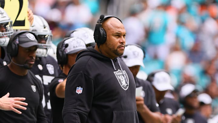 Nov 17, 2024; Miami Gardens, Florida, USA; Las Vegas Raiders head coach Antonio Pierce looks on from the sideline against the Miami Dolphins during the first quarter at Hard Rock Stadium. Mandatory Credit: Sam Navarro-Imagn Images