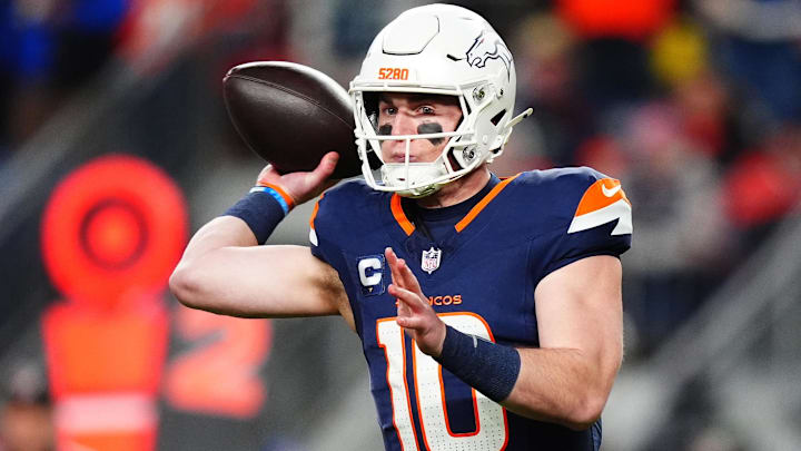 Dec 2, 2024; Denver, Colorado, USA; Denver Broncos quarterback Bo Nix (10) passes the ball in the first quarter against the Cleveland Browns at Empower Field at Mile High.