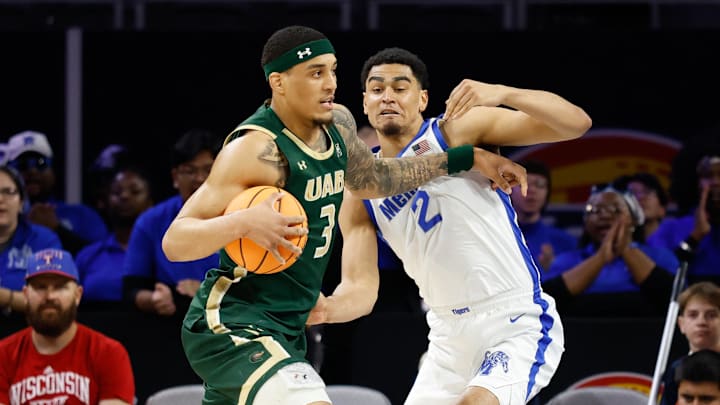 Mar 16, 2025; Fort Worth, TX, USA;  UAB Blazers forward Yaxel Lendeborg (3) drives to the basket as Memphis Tigers forward Nicholas Jourdain (2) defends during the first half at Dickies Arena. Mandatory Credit: Chris Jones-Imagn Images