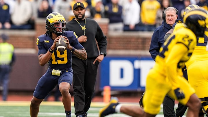 Michigan head coach Sherrone Moore watches quarterback Bryce Underwood (19) during the first half of the spring game at Michigan Stadium in Ann Arbor on Saturday, April 19, 2025.