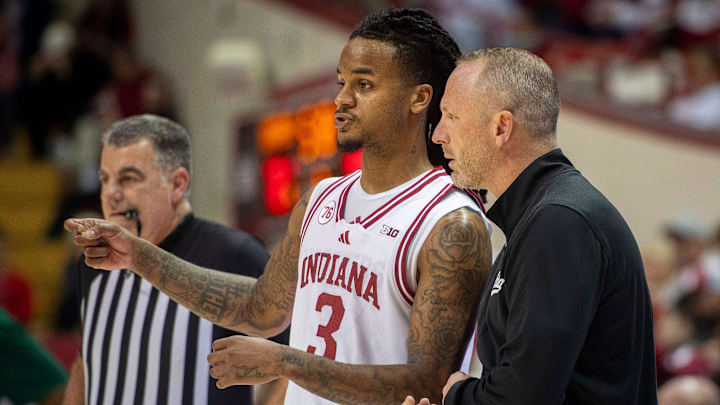 Indiana's Lamar Wilkerson (3) talks with Head Coach Darian DeVries during the Indiana versus Chicago State men's basketball game at Simon Skjodt Assembly Hall on Saturday, Dec. 20, 2025.