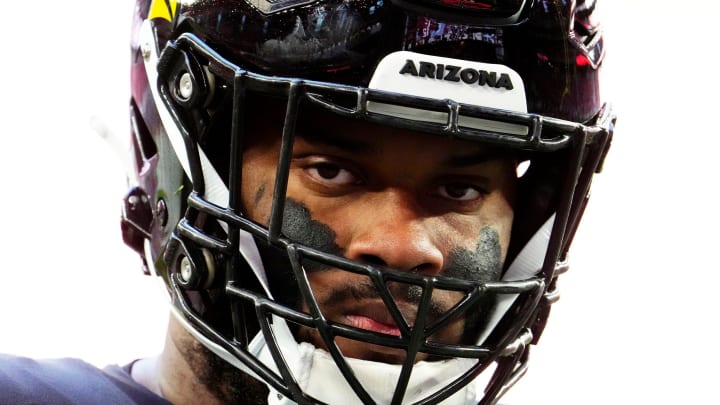 Nov 26, 2023; Glendale, AZ, USA; Arizona Cardinals offensive tackle Paris Johnson Jr. (70) during pregame warmups before playing the Los Angeles Rams at State Farm Stadium. Mandatory Credit: Rob Schumacher-Arizona Republic