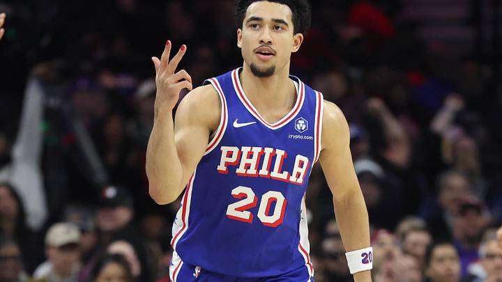 76ers guard Jared McCain reacts to his three pointer against the Bucks.