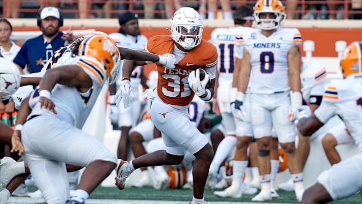 Sep 13, 2025; Austin, Texas, USA; Texas Longhorns running back James Simon (31) runs for yards during the second half against the Texas El Paso Miners at Darrell K Royal-Texas Memorial Stadium. Mandatory Credit: Scott Wachter-Imagn Images