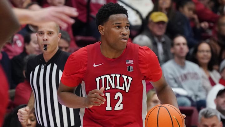 UNLV Runnin' Rebels guard Issac Williamson (12) dribbles upcourt against the Stanford Cardinal in the second half at Maples Pavilion. Mandatory Credit: David Gonzales-Imagn Images