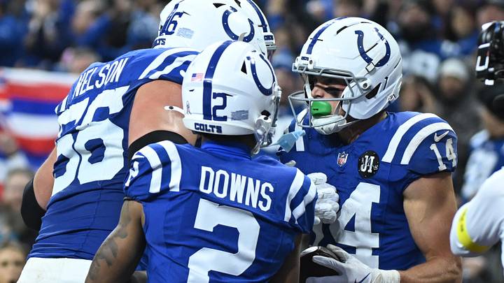 Nov 30, 2025; Indianapolis, Indiana, USA; Indianapolis Colts wide receiver Alec Pierce (14) celebrates after a touchdown with guard Quenton Nelson (56) and wide receiver Josh Downs (2) during the first half against the Houston Texans at Lucas Oil Stadium. Nov 30, 2025; Indianapolis, Indiana, USA; Indianapolis Colts wide receiver Alec Pierce (14) celebrates after a touchdown with guard Quenton Nelson (56) and wide receiver Josh Downs (2) during the first half against the Houston Texans at Lucas Oil Stadium.