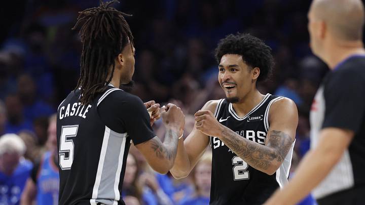 May 30, 2026; Oklahoma City, Oklahoma, USA; San Antonio Spurs guard Stephon Castle (5) and guard Dylan Harper (2) react in the fourth quarter against the Oklahoma City Thunder during game seven of the western conference finals for the 2026 NBA playoffs at Paycom Center. Mandatory Credit: Alonzo Adams-Imagn Images