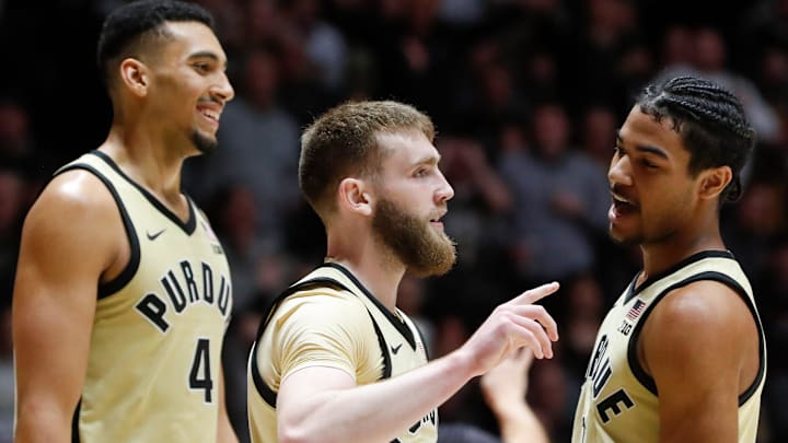 Purdue Boilermakers forward Trey Kaufman-Renn (4), guard Braden Smith (3) and guard C.J. Cox (0) celebrate