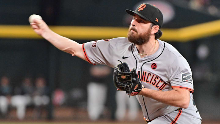 Sep 23, 2024; Phoenix, Arizona, USA;  San Francisco Giants pitcher Ryan Walker (74) throws in the ninth inning against the Arizona Diamondbacks at Chase Field. 