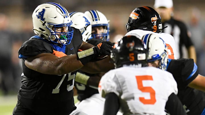 Auburn High School's Bradyn Joiner (75) against Hoover during their game 