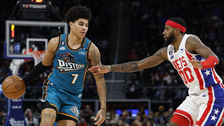 Dec 18, 2022; Detroit, Michigan, USA; Detroit Pistons guard Killian Hayes (7) dribbles defended by Brooklyn Nets forward Royce O'Neale (00) in the second half at Little Caesars Arena. Mandatory Credit: Rick Osentoski-USA TODAY Sportse Dec 18, 2022; Detroit, Michigan, USA; Detroit Pistons guard Killian Hayes (7) dribbles defended by Brooklyn Nets forward Royce O'Neale (00) in the second half at Little Caesars Arena. Mandatory Credit: Rick Osentoski-USA TODAY Sportse