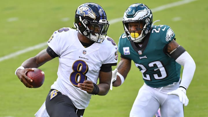 Oct 18, 2020; Philadelphia, Pennsylvania, USA; Baltimore Ravens quarterback Lamar Jackson (8) runs past Philadelphia Eagles free safety Rodney McLeod (23) during the first quarter at Lincoln Financial Field. Mandatory Credit: Eric Hartline-Imagn Images Oct 18, 2020; Philadelphia, Pennsylvania, USA; Baltimore Ravens quarterback Lamar Jackson (8) runs past Philadelphia Eagles free safety Rodney McLeod (23) during the first quarter at Lincoln Financial Field. Mandatory Credit: Eric Hartline-Imagn Images