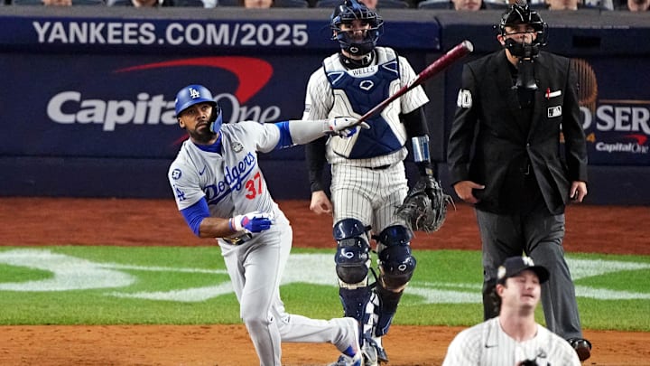Oct 30, 2024; New York, New York, USA; Los Angeles Dodgers outfielder Teoscar Hernandez (37) hits a two RBI double during the fifth inning against the New York Yankees in game four of the 2024 MLB World Series at Yankee Stadium. Mandatory Credit: Robert Deutsch-Imagn Images