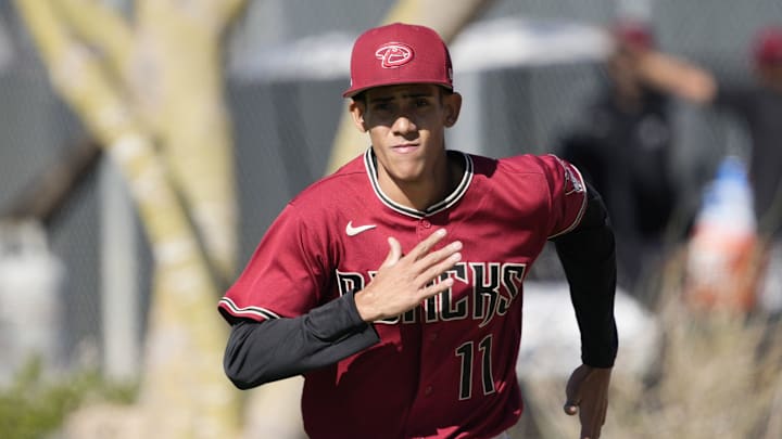 Feb 21, 2022; Scottsdale, Ariz., U.S.;  Diamondbacks minor league pitcher Joe Elbis runs during a select training camp for minor-league players not covered by the Players Association at Salt River Fields. MLB continues to be in a lockout after the expiration of the collective bargaining agreement Dec. 2. Mandatory Credit: Michael Chow-Arizona Republic

Baseball Diamondbacks Select Minor League Camp