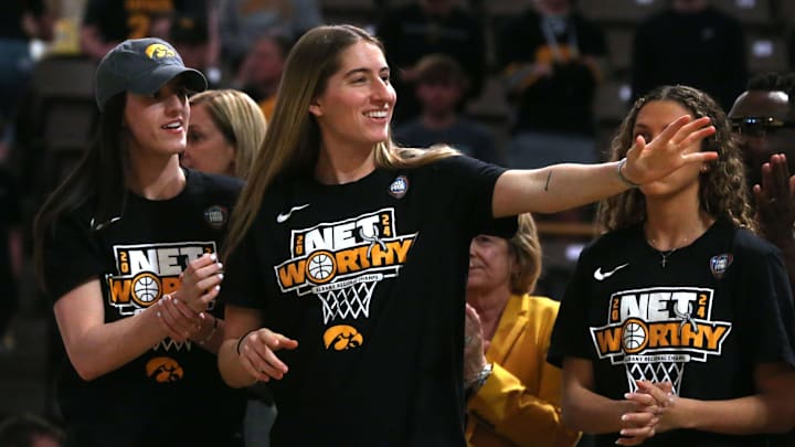 Iowa’s Kate Martin, right, waves at the crowd during a celebration of the Iowa women’s basketball team Wednesday, April 10, 2024 at Carver-Hawkeye Arena in Iowa City, Iowa.