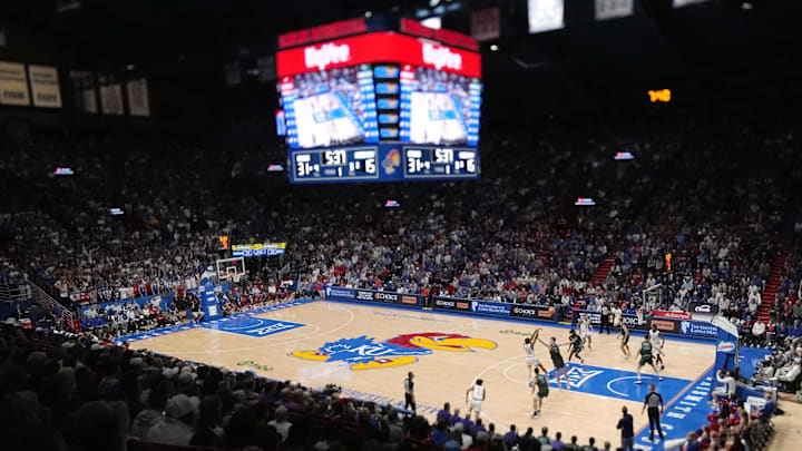 Nov 3, 2025; Lawrence, Kansas, USA; A general view of the court as Kansas Jayhawks guard Elmarko Jackson (13) shoots against during the first half against the Green Bay Phoenix at Allen Fieldhouse. Mandatory Credit: Jay Biggerstaff-Imagn Images