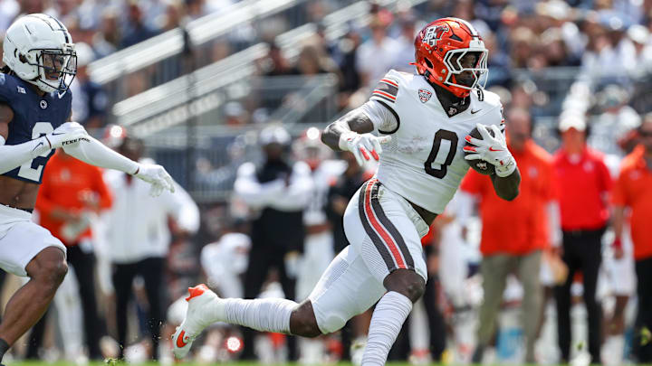 Sep 7, 2024; University Park, Pennsylvania, USA; Bowling Green Falcons tight end Harold Fannin Jr (0) runs with the ball during the second quarter against the Penn State Nittany Lions at Beaver Stadium. Mandatory Credit: Matthew O'Haren-Imagn Images