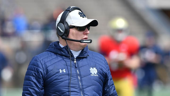 Apr 13, 2019; Notre Dame, IN, USA; Notre Dame Fighting Irish offensive Coordinator Chip Long watches in the first quarter of the Blue-Gold Game at Notre Dame Stadium. Mandatory Credit: Matt Cashore-Imagn Images