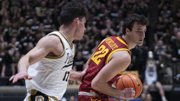 Iowa State Cyclones forward Milan Momcilovic (22) looks to get past Purdue Boilermakers guard Omer Mayer (17) Iowa State Cyclones forward Milan Momcilovic (22) looks to get past Purdue Boilermakers guard Omer Mayer (17)