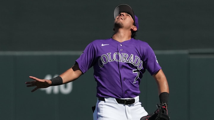Mar 2, 2026; Salt River Pima-Maricopa, Arizona, USA; Colorado Rockies third baseman Nicky Lopez (7) looks for the ball against the Los Angeles Dodgers in the second inning at Salt River Fields at Talking Stick. Mandatory Credit: Rick Scuteri-Imagn Images