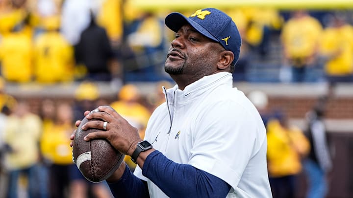 Michigan Offensive Pass Game Coordinator and Wide Receivers coach Ron Bellamy warms up with players before the Texas game at Michigan Stadium in Ann Arbor on Saturday, September 7, 2024. Michigan Offensive Pass Game Coordinator and Wide Receivers coach Ron Bellamy warms up with players before the Texas game at Michigan Stadium in Ann Arbor on Saturday, September 7, 2024.