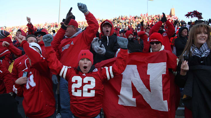 Husker fans cheer on Nebraska against the Iowa Hawkeyes.