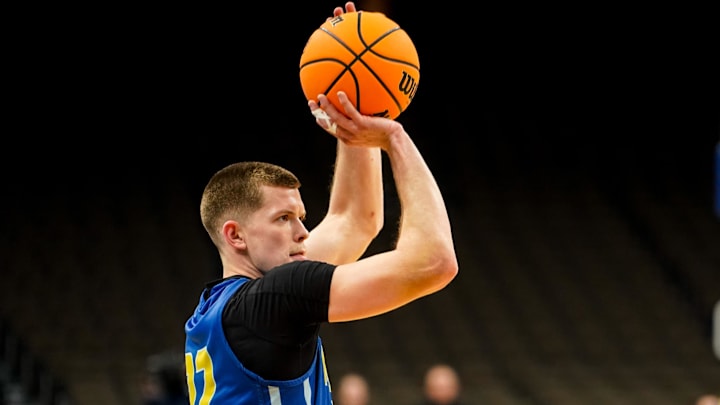 Mar 20, 2024; Omaha, NE, USA; Morehead State Eagles guard Riley Minix (22) warms up.