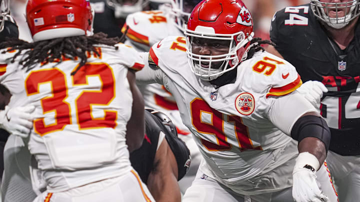 Sep 22, 2024; Atlanta, Georgia, USA; Kansas City Chiefs defensive tackle Derrick Nnadi (91) looks to tackle Atlanta Falcons running back Bijan Robinson (7) during the second half at Mercedes-Benz Stadium. Mandatory Credit: Dale Zanine-Imagn Images Sep 22, 2024; Atlanta, Georgia, USA; Kansas City Chiefs defensive tackle Derrick Nnadi (91) looks to tackle Atlanta Falcons running back Bijan Robinson (7) during the second half at Mercedes-Benz Stadium. Mandatory Credit: Dale Zanine-Imagn Images