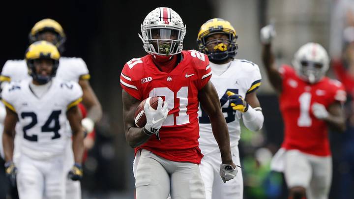 Ohio State Buckeyes wide receiver Parris Campbell Jr. (21) scores a rushing touchdown against Michigan Wolverines in the 4th quarter of their game at Ohio Stadium in Columbus, Ohio on November 24, 2018. Ohio State Buckeyes wide receiver Parris Campbell Jr. (21) scores a rushing touchdown against Michigan Wolverines in the 4th quarter of their game at Ohio Stadium in Columbus, Ohio on November 24, 2018.