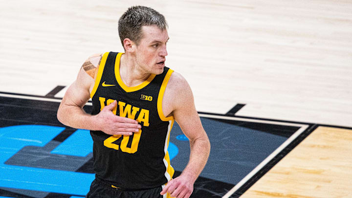 Mar 13, 2025; Indianapolis, IN, USA; Iowa Hawkeyes forward Payton Sandfort (20) celebrates a made basket in the first half Illinois Fighting Illini at Gainbridge Fieldhouse. Mandatory Credit: Trevor Ruszkowski-Imagn Images