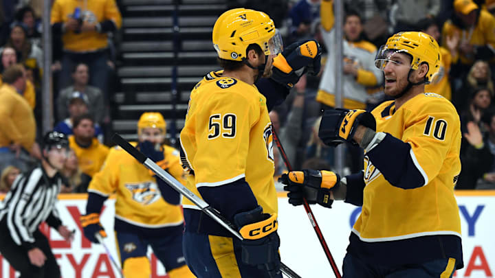  Nashville Predators defenseman Roman Josi (59) celebrates with Colton Sissons (10)